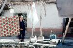 girl hanging laundry, Clothesline, Washingline, Hazar Hani, Iran, PDLV01P08_07