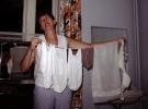 Girl Laundering her lingerie, hanging to dry, Drying Rack