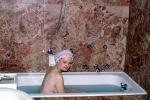 1950s housewife, bathtub. marble, shower cap, bathwater, 1950s