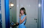 Teen Girl Primping, putting on Lipstick, 1960s, PDRV02P01_14
