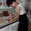 Mother Washes Baby in Sink, 1950s, PDRV02P02_06