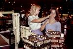 Two Women Shopping, Ear Rings, interior, inside, indoors, shoppers, jewelry, necklace, smiles, racks, 1980s