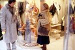woman with fur coat, man, displays, purse, window shopping, hat, January 1986, PDSV06P01_06