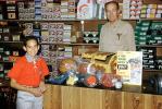 Sports store, Boy, clerk, Mr. Wheeler, Arcadia Sporting Goods, December 16, 1958, 1950s, PDSV07P03_03