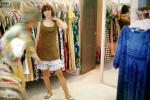 Woman, shopping, dress, mirror, clothing store, interior, inside, indoors, shopper, April 1966, 1960s