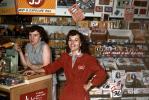 Cashier, Women, Camera Store, film, counter, 1950s
