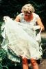 Lady lifts her Dress, Smiling, Funny, Striptease, Retro, 1950s, PEFV03P01_07B