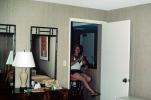 Woman in a hotel room, longline bra, PEFV03P04_14