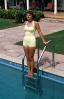 Lady in her Onsie Swimsuit, steps legs, leggy, 1950s, PFAV03P03_01B