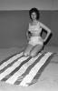 Woman in Full Cut Panties bikini, towel, 1960s, PFAV03P03_04