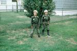Two Army soldiers, Boys, boots, helmets, uniform