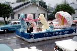 Vet's Surplus Store, Clamshell, Strawberry Festival, Lakeland Parade, Rainy Wet, Cars, Streets, Float, Car, automobile, 1950s, PFPV05P12_13