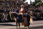 Fat Cowboy, Rider, Rose Parade, backlit tail, horsetail, crowds, January 1961, 1960s, PFPV05P15_12