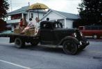 Flatbed Truck, hay bales, women, Sulfer Springs Sesquicentennial Parade, Tiro-Auburn, Ohio, July 1983, 1980s