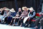 Chinese Women Sitting on a Bench, Hats