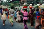 Girl, Crowds, Walking, Bali, Porosan offerings, PFSV01P10_12B