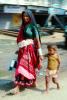 Woman and child walking, Ahmadabad, PFSV02P06_06B