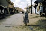 Woman Walking, Dirt Road, unpaved, Burka, Medina Marrakech, 1952, 1950s