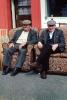 two men sitting on a sofa, PFSV05P14_05B