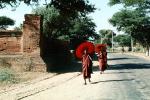 Monks Walking down the street, Bagan, Myanmar