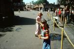 Girls, Females, Feminine, Tween, overalls, sunny day, chain link fence, Laura's 9th Birthday, 1960s, PFTV03P09_07