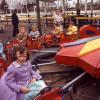 Girl, Firetrucks, Ride, Fun, Purple Coat, smiles, laughing, 1960s, PFTV04P03_09