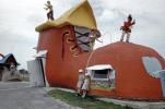 Girl and Boy at a big Shoe House, roof, patch, hats, bloomers, Shoe Lace, 1950s