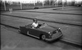 Little Girl Driving a Car, Cadillac, 1950s