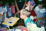 Boy Blowing out a Birthday Cake, candles, girl, cap, making a wish, PHBV02P13_03