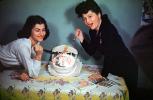 Women, Funny, Stabbing a Cake, Table, flowers, floral, 1950s