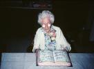 104 years young, Cake, woman, glasses, sweater, 1950s, PHBV03P06_19