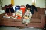 Boy on a Sofa with Birthday Gifts, 1950s, PHBV04P02_12