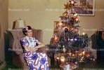 Christmas Tree decorated, decorations, woman sitting, 1940s, PHCV01P10_16