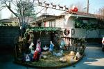nativity scene, reindeer, Santa Claus, lawn, front yard, sled, home, house, building, PHCV01P15_04