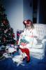 girl, chair, unwrapping presents, Christmas Morning, 1960s, PHCV02P13_15