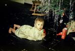 Baby under a Christmas Tree, toddler, 1950s