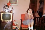 woman, female, santa claus, television, pants, socks, chair, 1950s