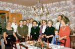 Grandma, dinning, dinner, smiles, chandelier, wallpaper, necklace, women, men, girl, 1950s, PHCV03P12_01