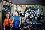 Flowers, Bell hop, woman, bellhop, singing telegram, 1950s, PHCV03P12_10