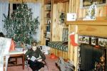 boy reading, fireplace, sitting, Tree, Presents, Gifts, Decorations, Ornaments, 1950s