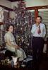 Woman, Man talking, tree, ornaments, decorated, 1950s