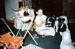 Girl with her Dogs, Doll, Changing Table, December 1953