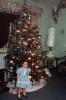 Little Girl stands under a Decorated Christmas Tree, PHCV05P08_02