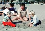 Grandpa Playing in the sand with grandaughters, Laguna Beach, PKFV02P11_15
