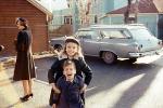 Sister, Brother, Smiles, Siblings, formal dress, coasts, car, Dodge, Station Wagon, February 1986, 1960s
