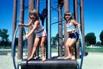 Girls at tope of Slide, happy, smiles, steps, PLGV02P02_12