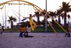 Teens on a Swing Set, Venice, 1970s, PLGV02P03_12