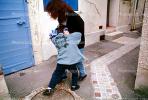 Girl Wresteling and Playing Matador, El Toro, Arles France