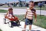 boy, girl, brother, sister, wagon, mailbox, sidewalk, 1960s, PLGV03P04_17