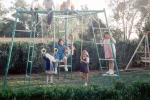 swing set, girls, backyard, Riverside California, April 1970, 1970s, PLGV03P06_09